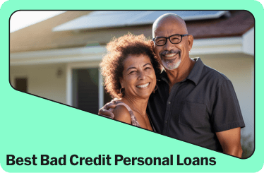 Smiling couple looking at the camera after securing a personal loan with bad credit